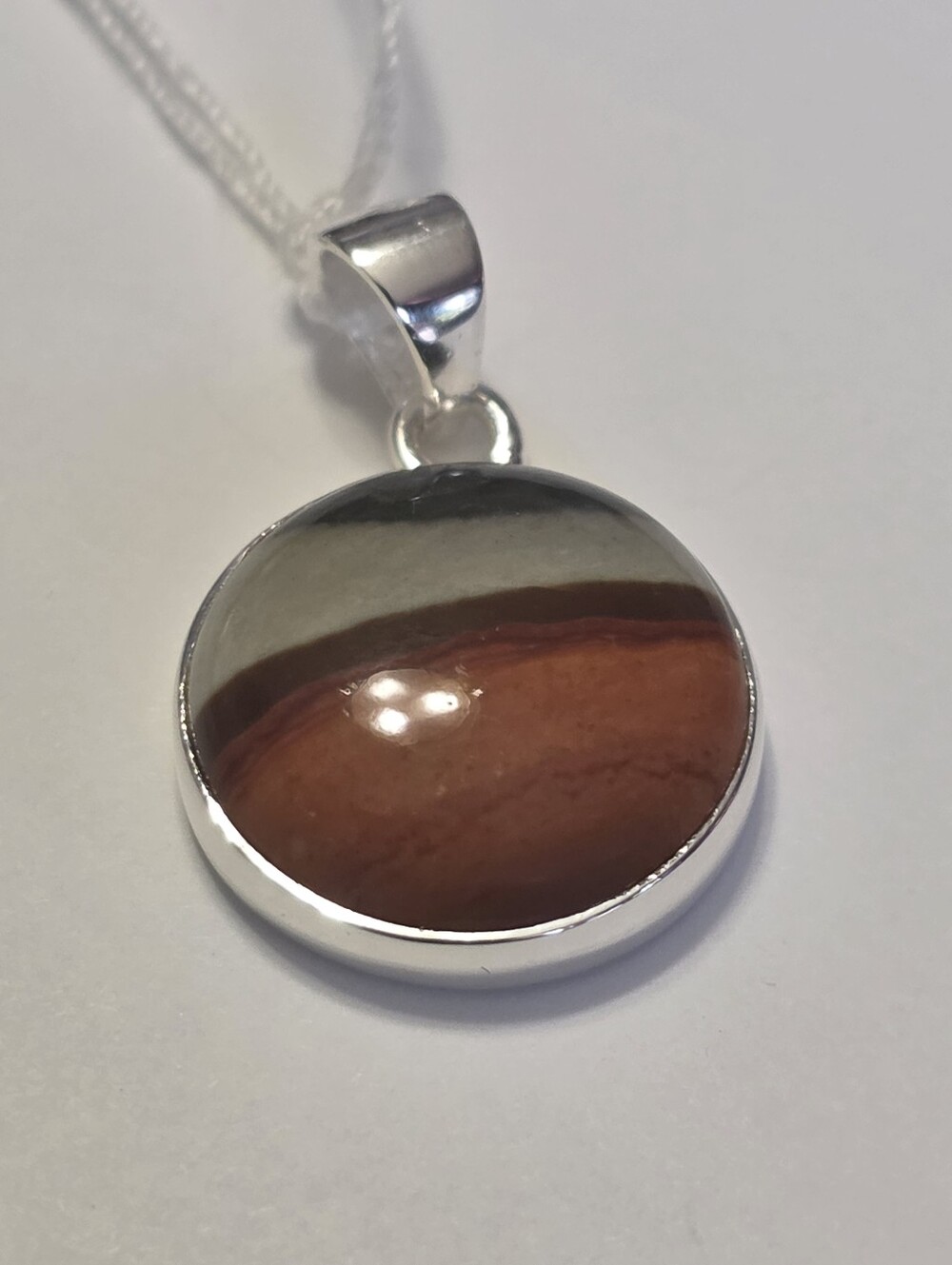 Sterling Silver Poly Chrome Jasper Round Pendant.